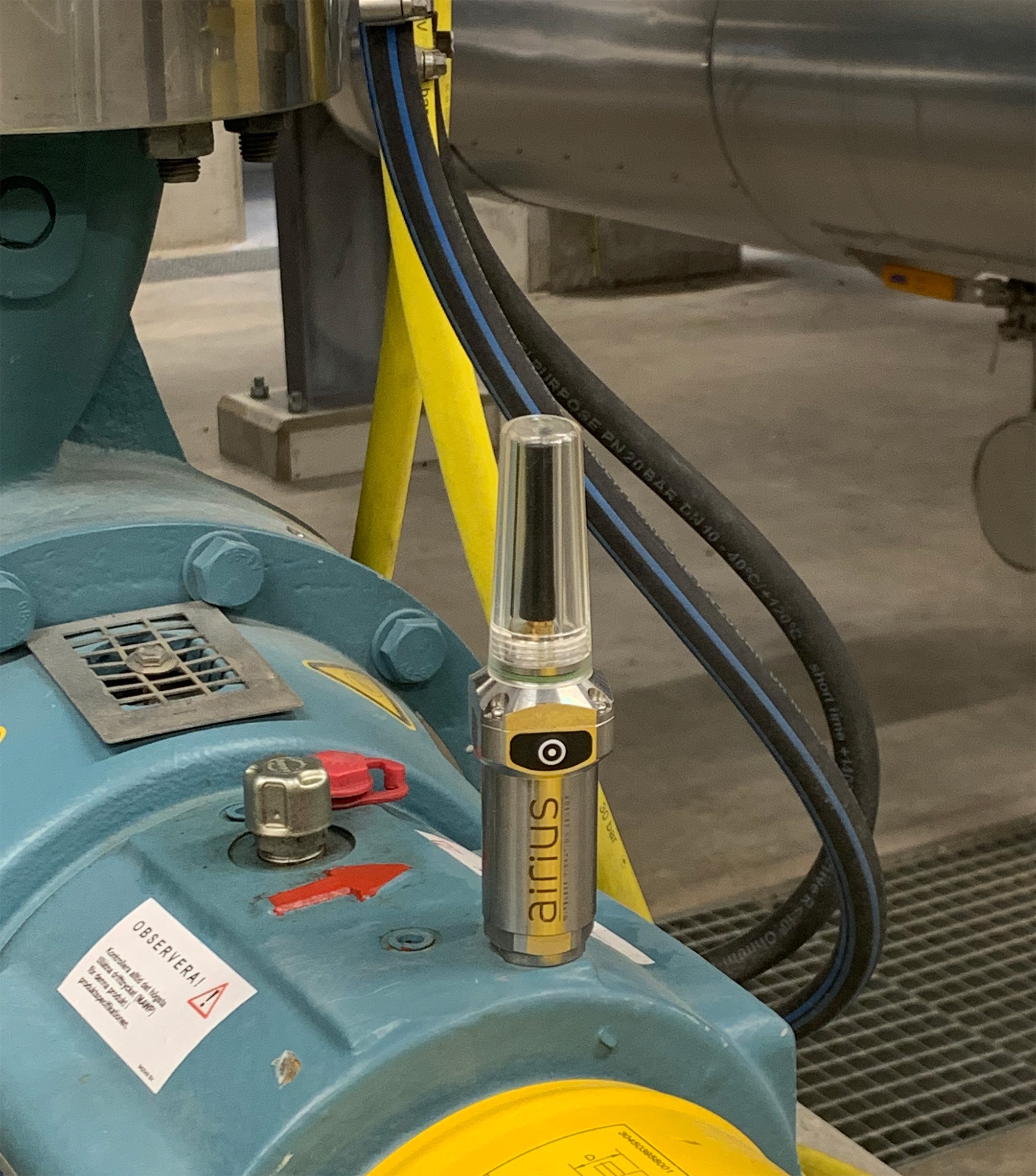 Closeup of the Airius sensor in industrial environment