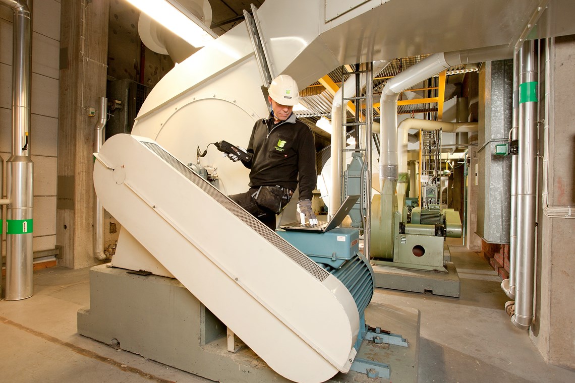 Man using Leonova Diamond for field measurements in industrial environment